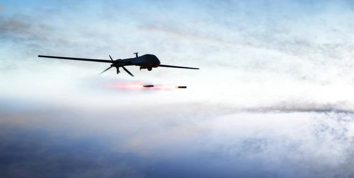 Unmanned aircraft above a cloud-covered landscape